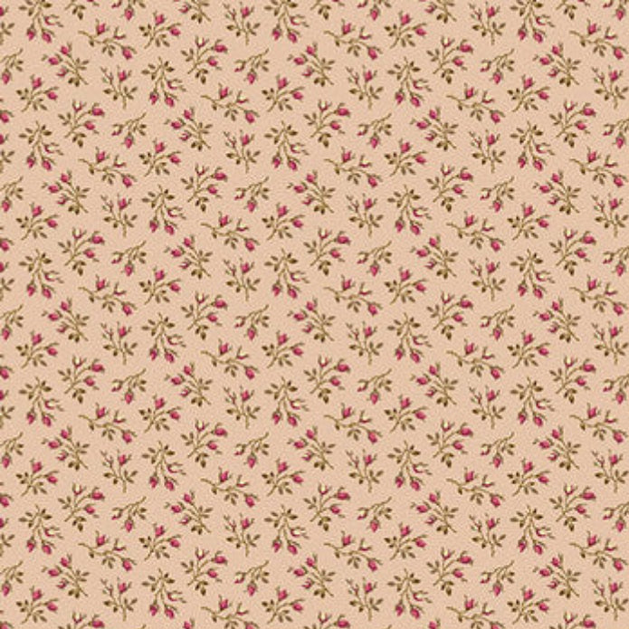 A close-up of a fabric pattern featuring small pink flowers and green leaves on a warm beige background, with a measuring ruler along the bottom edge showing the scale.