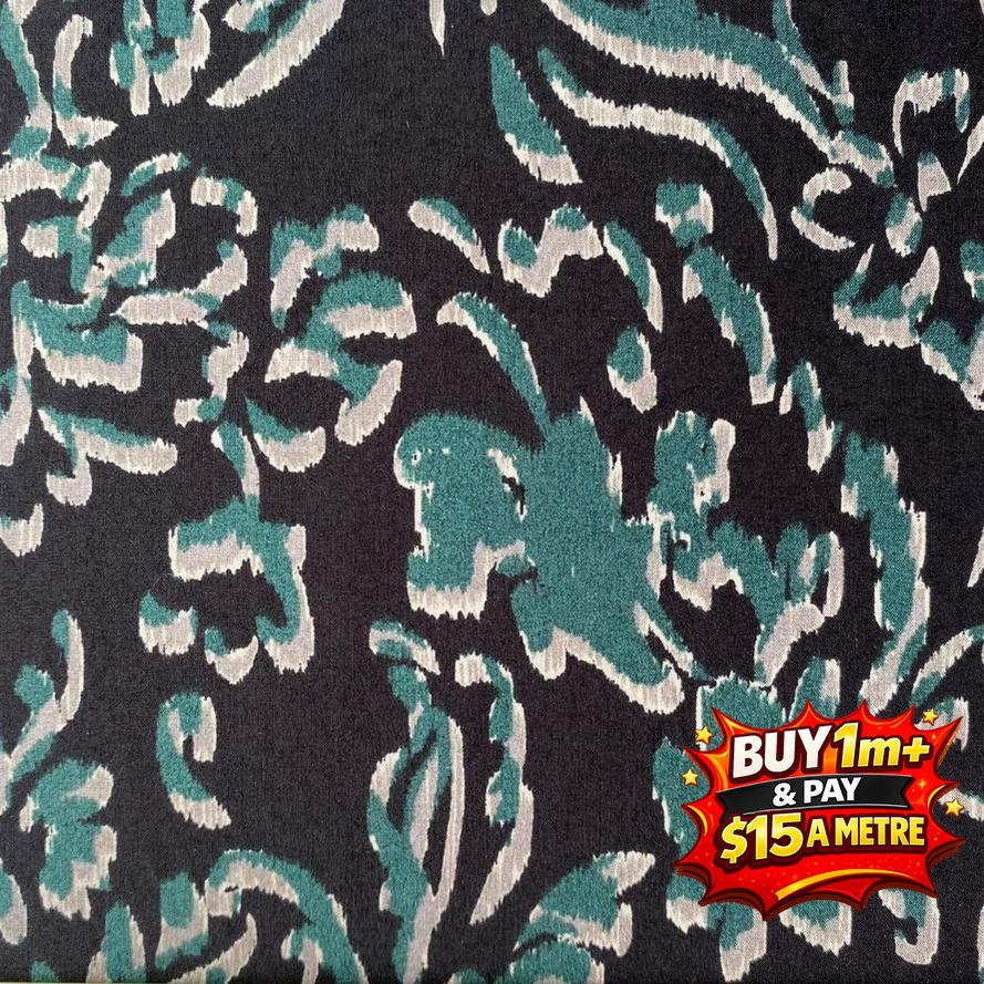 Dark gray cotton print fabric with abstract teal and light gray brushstroke patterns.