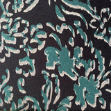 Dark gray cotton print fabric with abstract teal and light gray brushstroke patterns.
