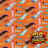 Orange fabric with a repeating pattern of colorful Hot Wheels logos and "Made to Race" text.