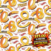 White fabric with repeating Hot Wheels race track design, orange loops, cars, and "Race to Win" text.