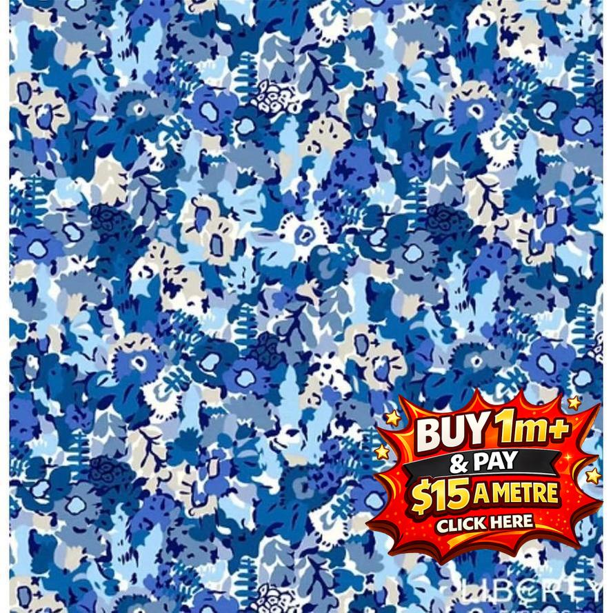LIBERTY Garden Party Meadow Haze fabric, blue floral print with white and grey accents.