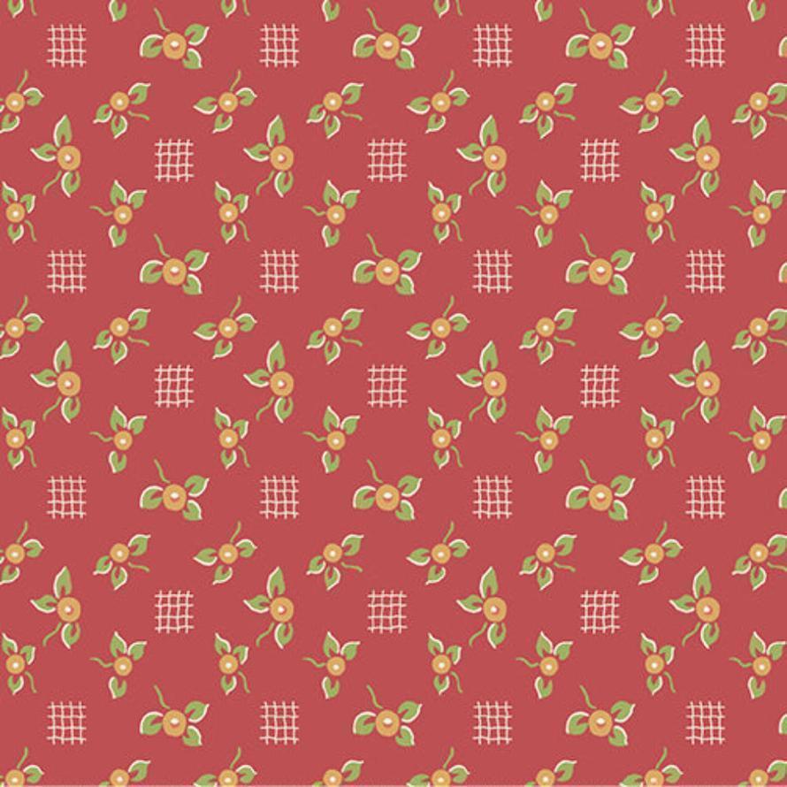 Red fabric with a repeating pattern of small coral flowers, green leaves, and white crosshatch grids.