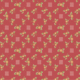 Red fabric with a repeating pattern of small coral flowers, green leaves, and white crosshatch grids.