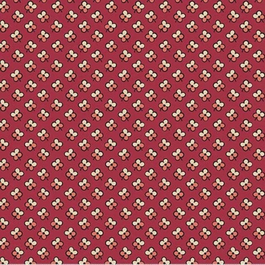 Rambling Rose A-1200-R Renee Nanneman red fabric with small cream and pink floral print.