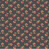 Dark gray fabric with a repeating pattern of small red and yellow flowers with green stems.