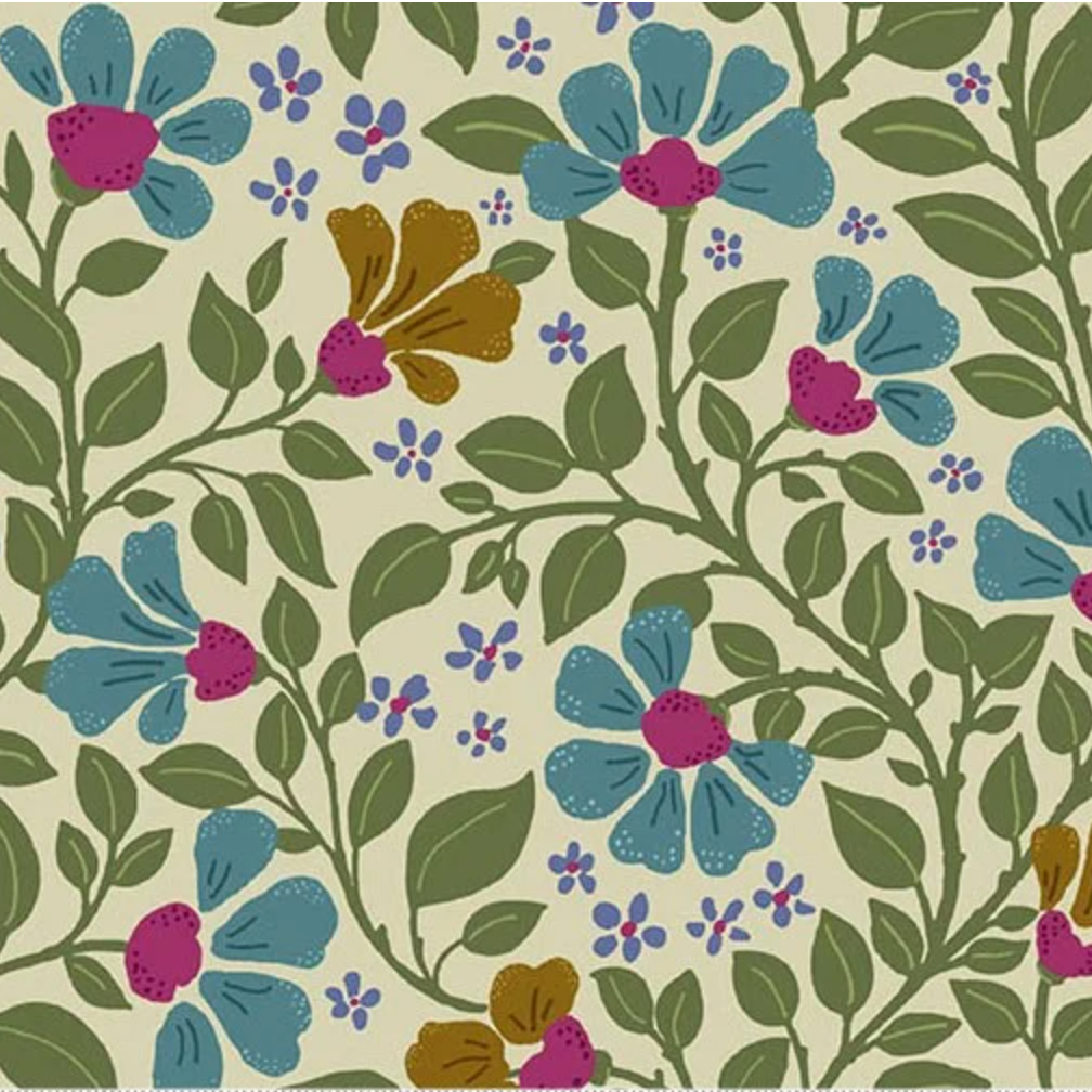 A repeating floral pattern with large blue flowers and magenta centers, olive green leaves and vines, small purple blossoms, and a few mustard-yellow flowers on a warm cream background.
