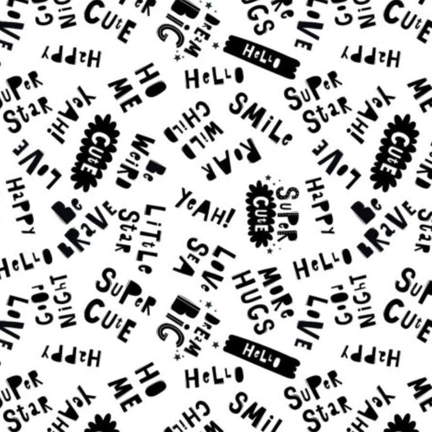 White fabric with black words like "Wild Child," "Cute," "Smile," and "Love.