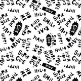 White fabric with black words like "Wild Child," "Cute," "Smile," and "Love.