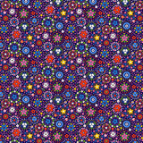 A dense, seamless floral pattern featuring small, colorful flower motifs in red, blue, pink, yellow, green, and white on a dark purple background.