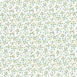 A repeating floral pattern on a white background with small mint green and pale blue flowers and olive-green stems, plus a 10-inch ruler along the bottom edge.