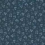 A close-up of a navy blue fabric with a delicate repeating pattern of small white flowers, light blue leaves, and pale green dots.