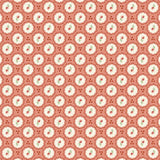 A repeating vintage-style floral pattern featuring cream-colored scalloped circles with small red cherries and green leaves on a warm coral-red background.