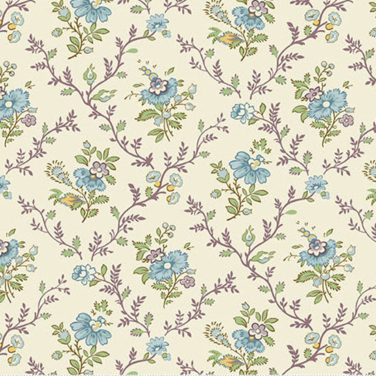 A repeating floral fabric pattern on a warm cream background, featuring blue flowers, green leaves, and brownish-purple vines. A ruler scale and the brand name 'andover' are visible along the bottom edge.