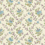 A repeating floral fabric pattern on a warm cream background, featuring blue flowers, green leaves, and brownish-purple vines. A ruler scale and the brand name 'andover' are visible along the bottom edge.