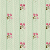 Patterned fabric with pink flowers and green leaves on a light green background
