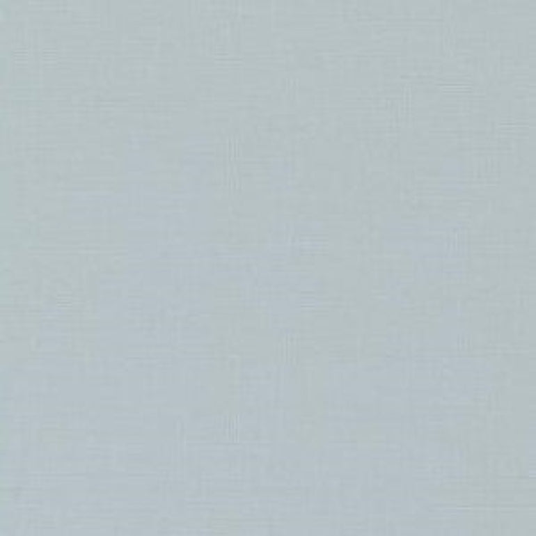 A close-up of a light blue-gray textured fabric surface filling the frame.
