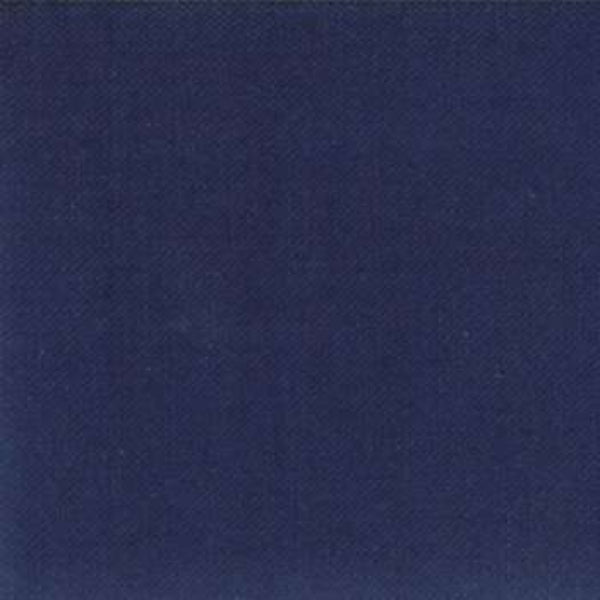 A close-up of a dark navy blue textured fabric or material swatch filling the frame.