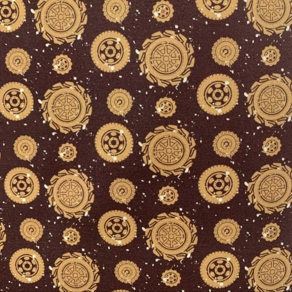 Pattern of gold gears on a brown background