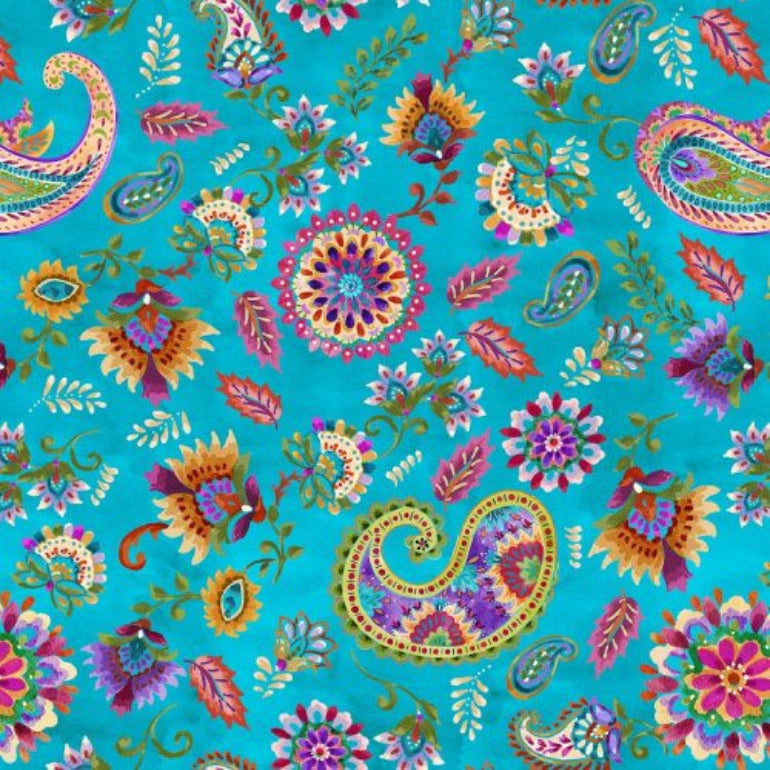 A close-up of a colorful paisley and floral pattern on a bright turquoise background, featuring intricate motifs in pink, purple, orange, green, yellow, and white.