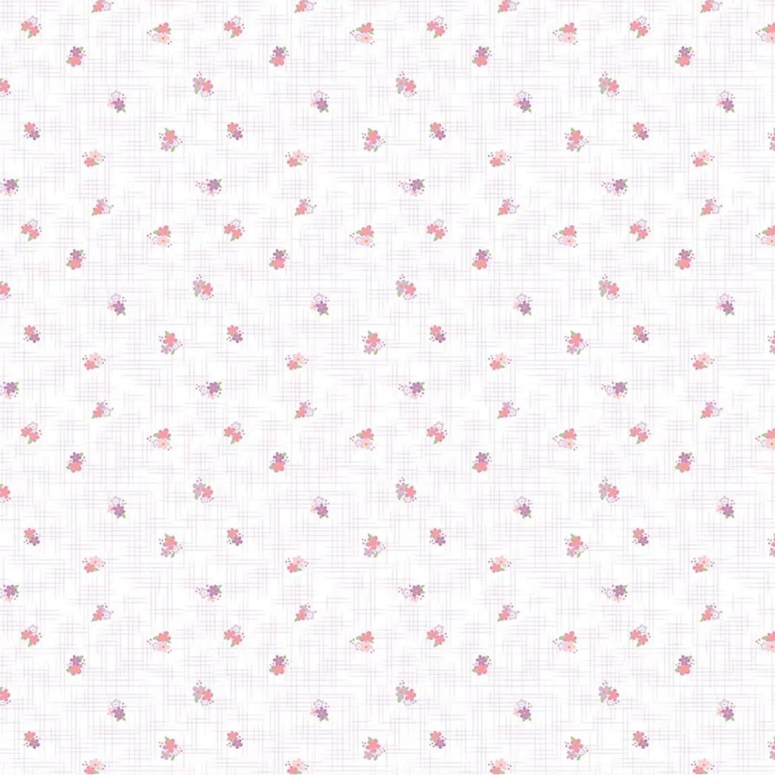 White fabric with a delicate pink and purple floral pattern and a ruler along the bottom edge showing measurements.
