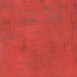 Red fabric texture with a ruler at the bottom for scale