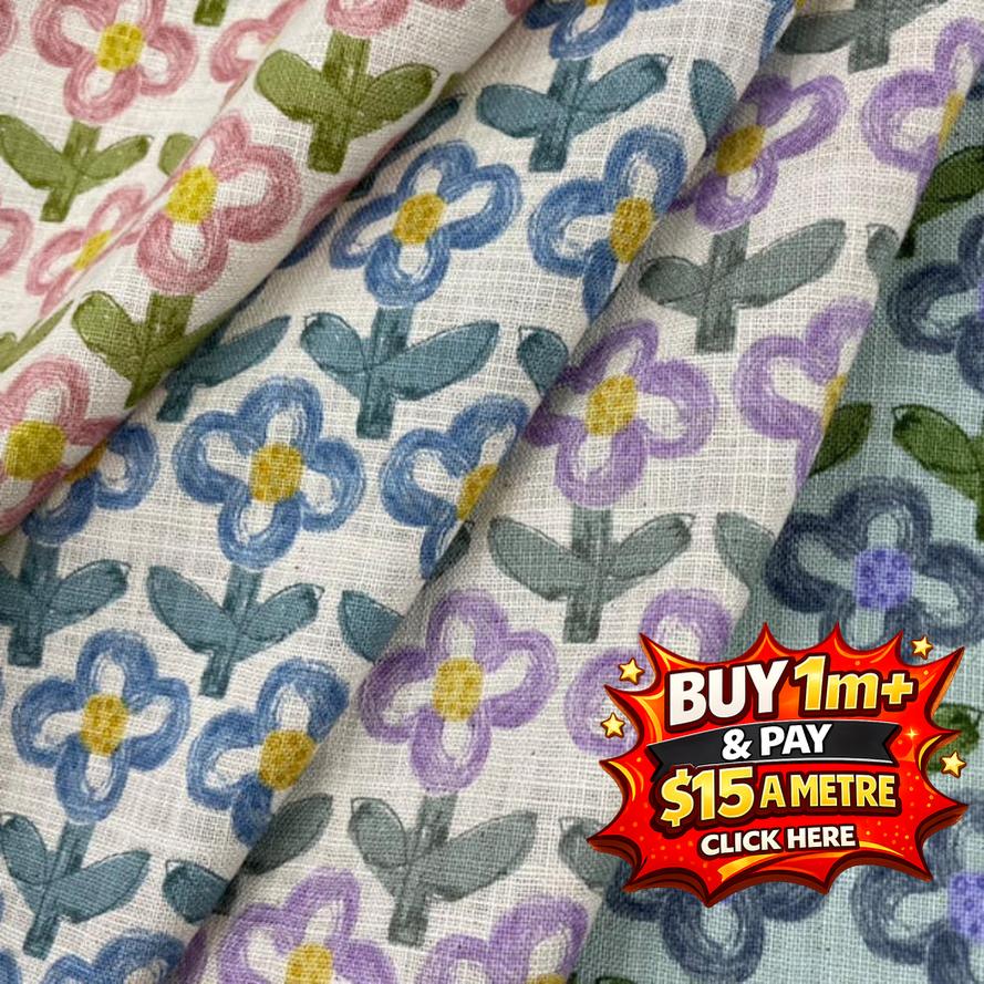 Hanako cotton poplin fabric with colorful floral print in pink, blue, and purple on a light background.