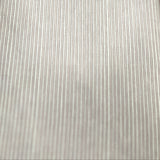 A close-up of a light gray ribbed fabric or material sample laid flat on a wooden surface.