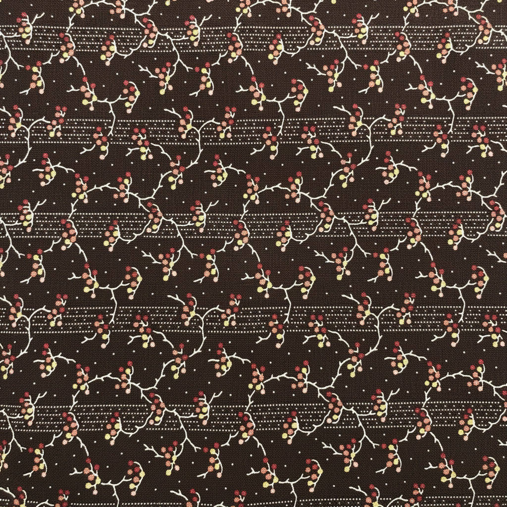 A close-up of a dark brown patterned fabric or wallpaper featuring a repeating floral and vine motif in cream, red, and muted blue, with a decorative border visible along the left edge.