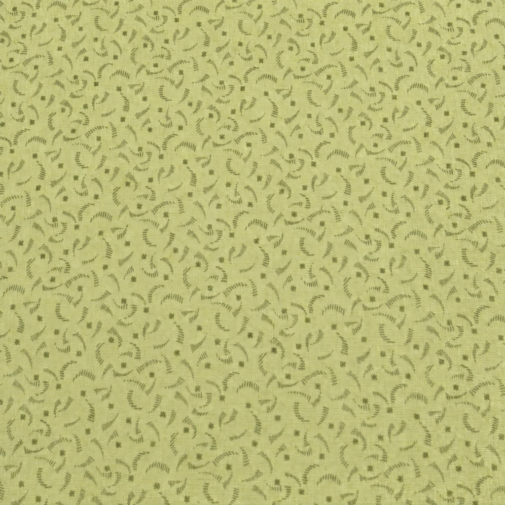 A long rectangular sheet of beige wallpaper or adhesive contact paper with a dense, small-scale dark gray abstract wavy pattern, laid flat on a dark reddish-brown wooden surface.