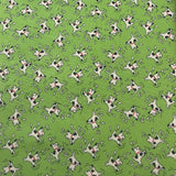 Puppies on Green background DAYVIEW TEXTILES 2053