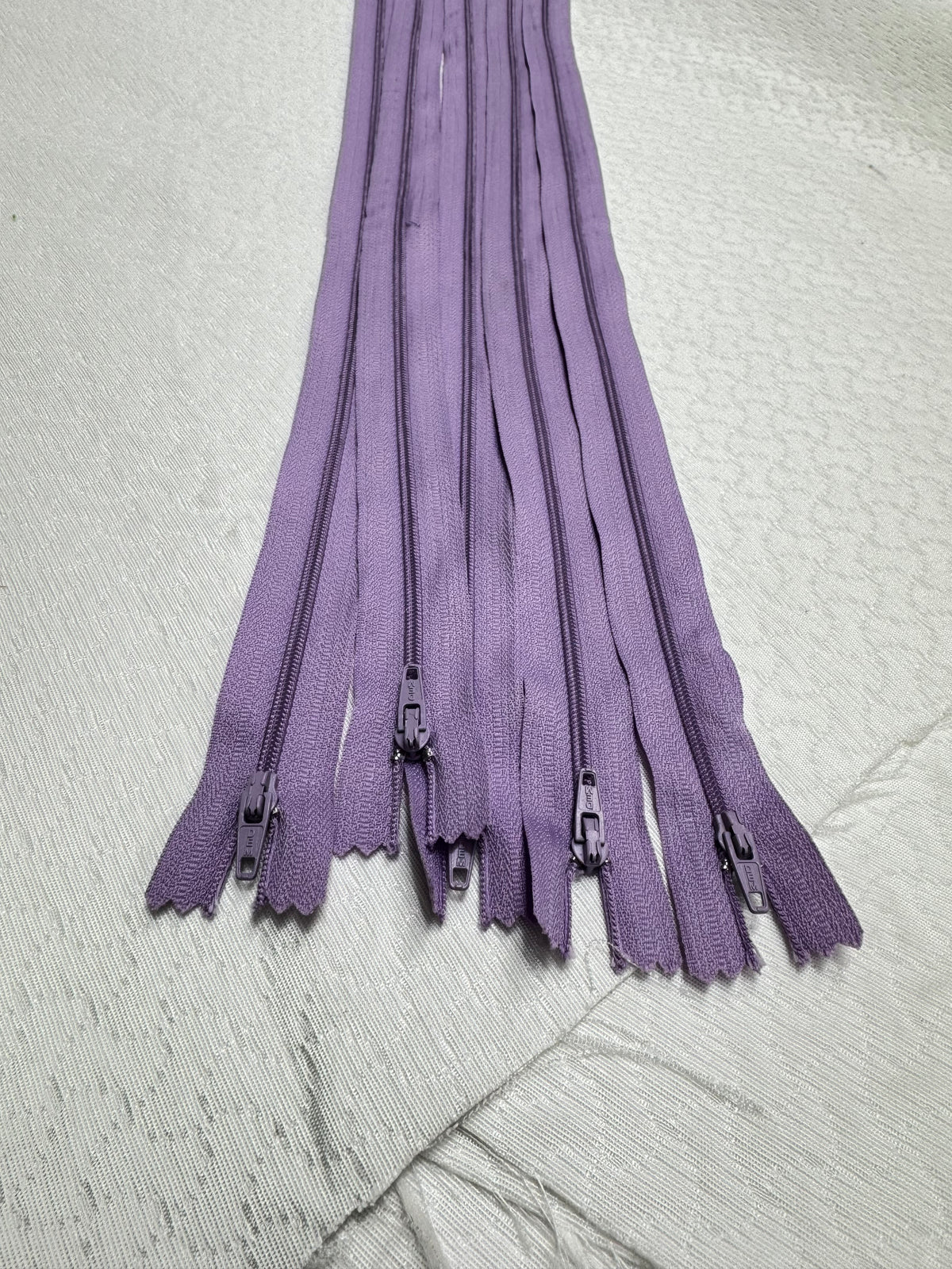 Zip Mauve 55 cm
