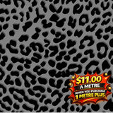 Ash grey fabric with black leopard print, featuring a red and yellow price tag for $11.00 a metre.