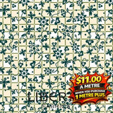 Liberty Arthurs Garden 2 fabric: cream with dark green floral vine pattern on a checkered background.