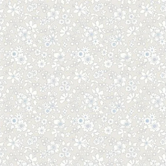 A repeating floral pattern with small white and light blue flowers on a warm light beige background.