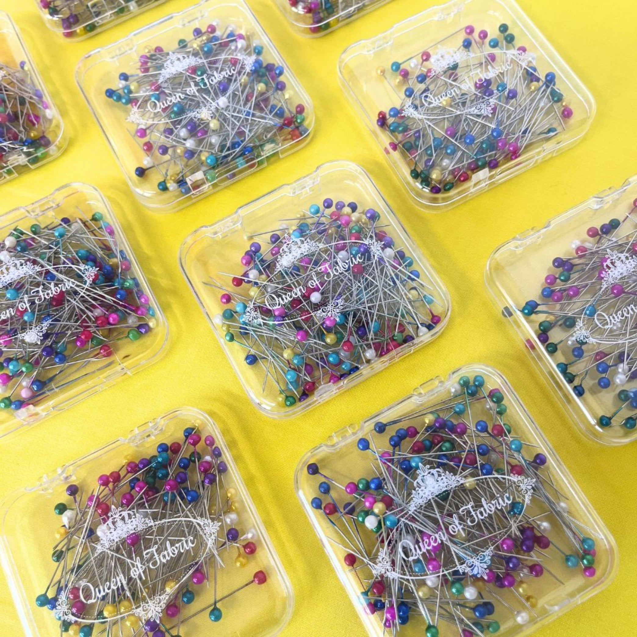 "Queen of Fabric Multicolor Pearlescent Straight Pins, 19mm long with 0.6mm diameter, perfect for sewing and quilting projects."