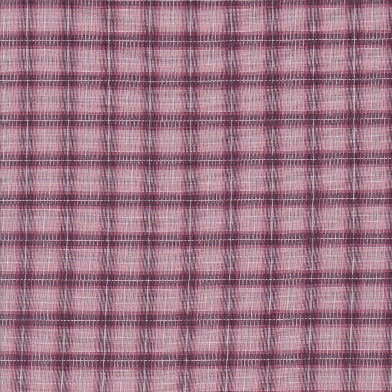 A close-up of a pink and purple plaid fabric pattern with thin white intersecting lines.