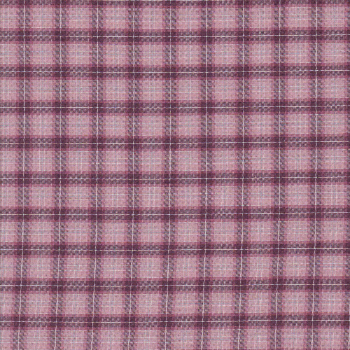 A close-up of a pink and purple plaid fabric pattern with thin white intersecting lines.
