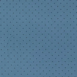 A close-up of a blue fabric or material surface with a repeating small dark polka dot pattern.