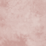A close-up of a dusty rose pink fabric with a subtle mottled texture.