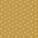 A repeating pattern of small white floral clusters on a warm mustard-yellow background.