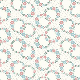 A repeating floral pattern on a warm off-white background, featuring small pink and light blue flowers with green leaves arranged in oval wreaths and dotted accents.