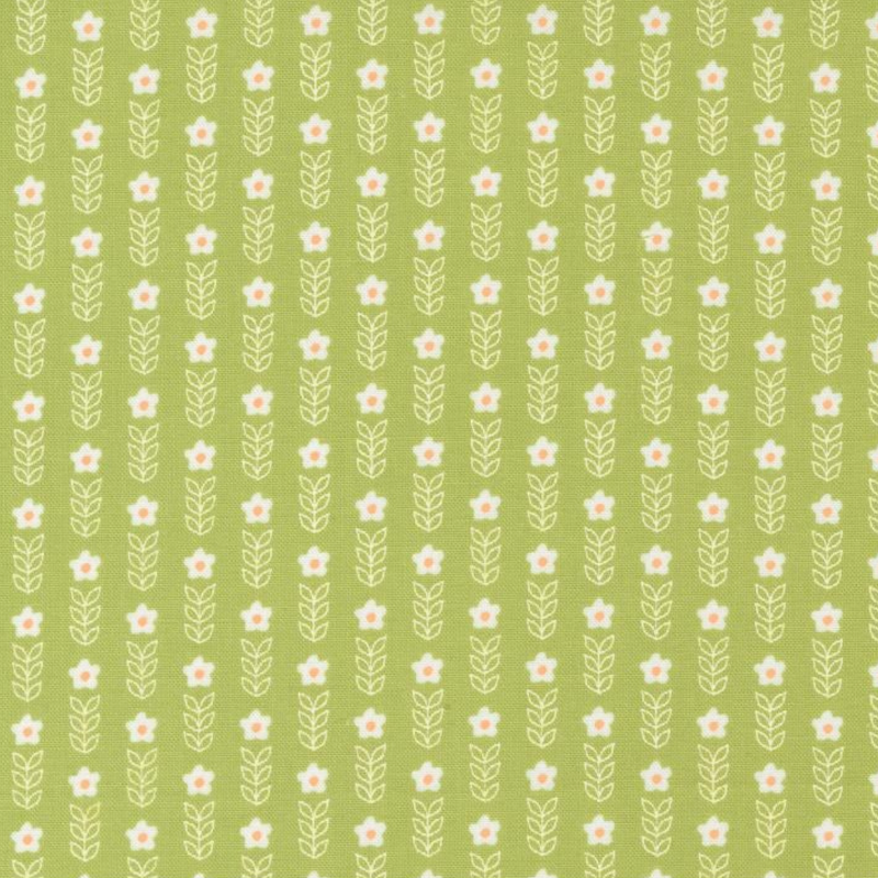 A repeating floral pattern on a light olive green background, featuring small white flowers with pale pink centers and simple leafy stems.