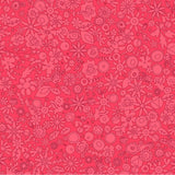 A close-up of a pink fabric pattern featuring a dense, repeating hand-drawn floral and botanical design in darker pink outlines. A white ruler with black markings and the 'andover' brand logo is visible along the bottom edge.