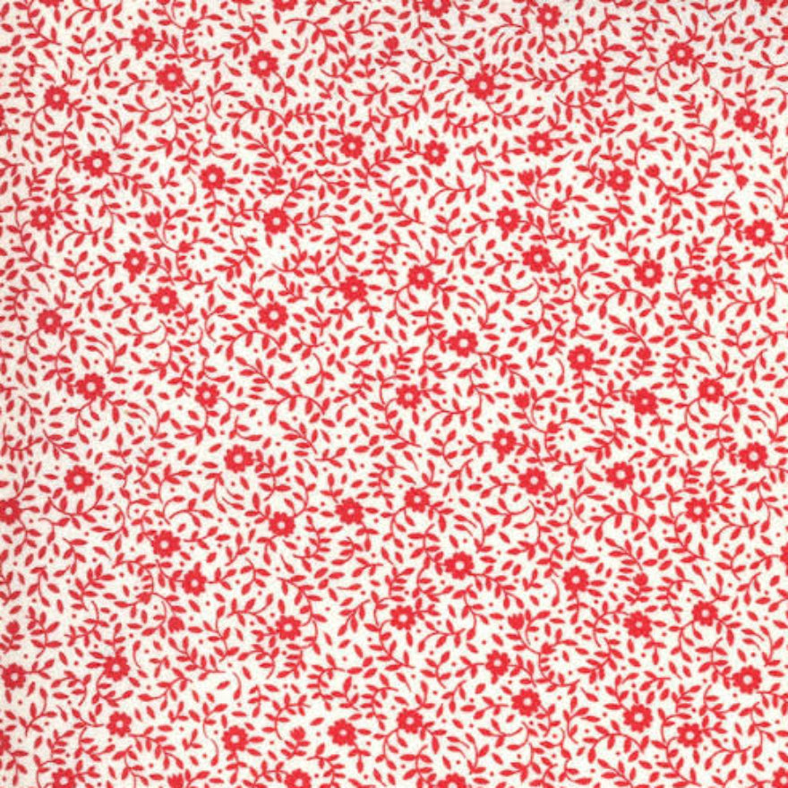 Red and white floral fabric pattern with a ruler at the bottom to show scale, branded with Modla.