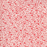 Red and white floral fabric pattern with a ruler at the bottom to show scale, branded with Modla.