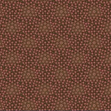 A close-up of a fabric pattern with a dense repeating design of small pink dots over a warm brown and tan background, with a ruler along the bottom edge showing measurements.