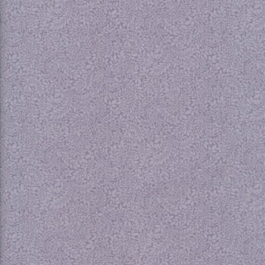 A close-up of a textured lavender-purple material, likely fabric or leather, filling the entire frame.
