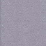 A close-up of a textured lavender-purple material, likely fabric or leather, filling the entire frame.