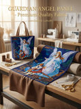 Blue Guardian Angel fabric panel with white wings, brown tote bag, and sewing supplies.
